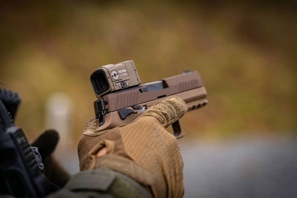 Red Rots for Duty Pistols 1 Aimpoint ACRO RDS on a P320 pistol, in FDE
